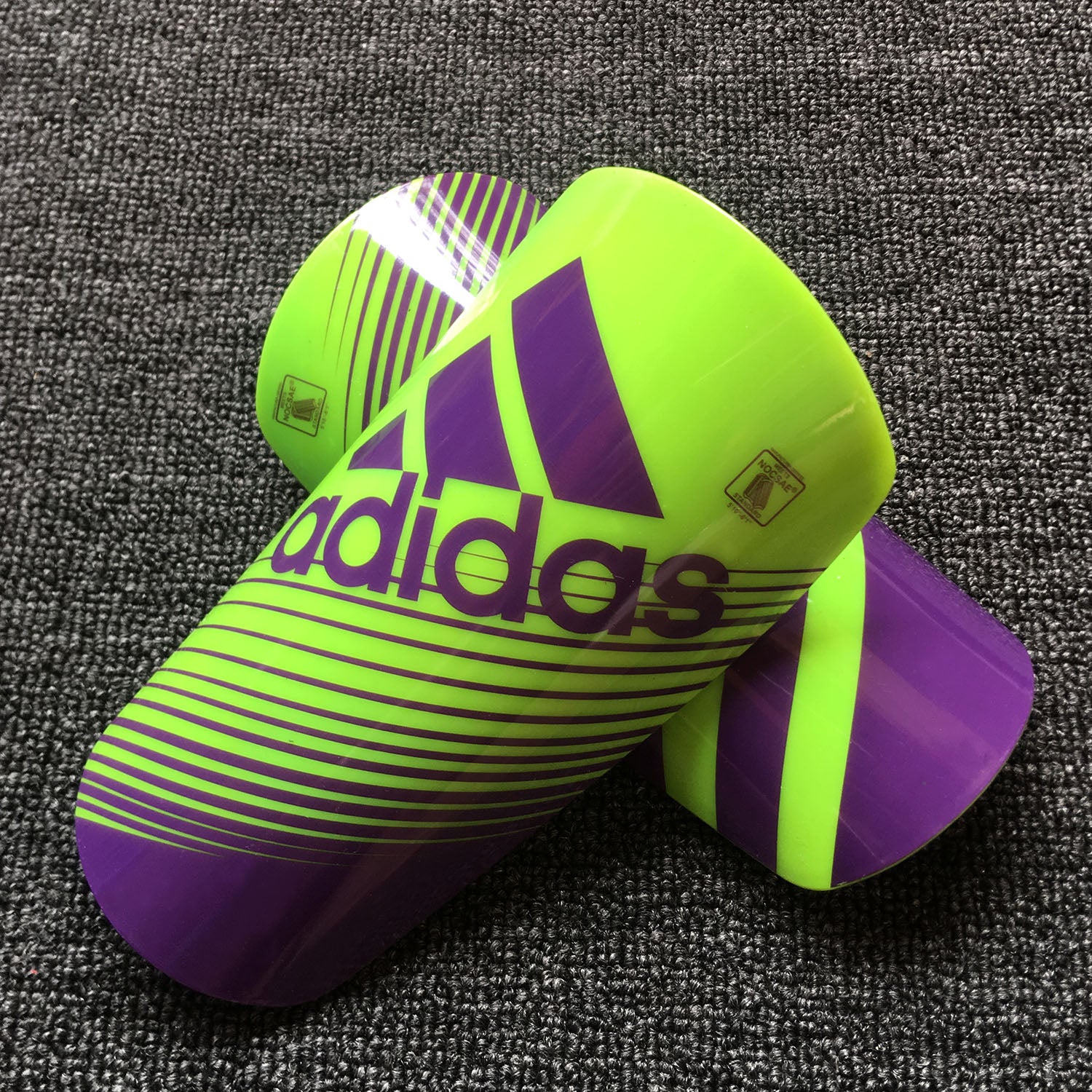 adidas green/purple shin guards