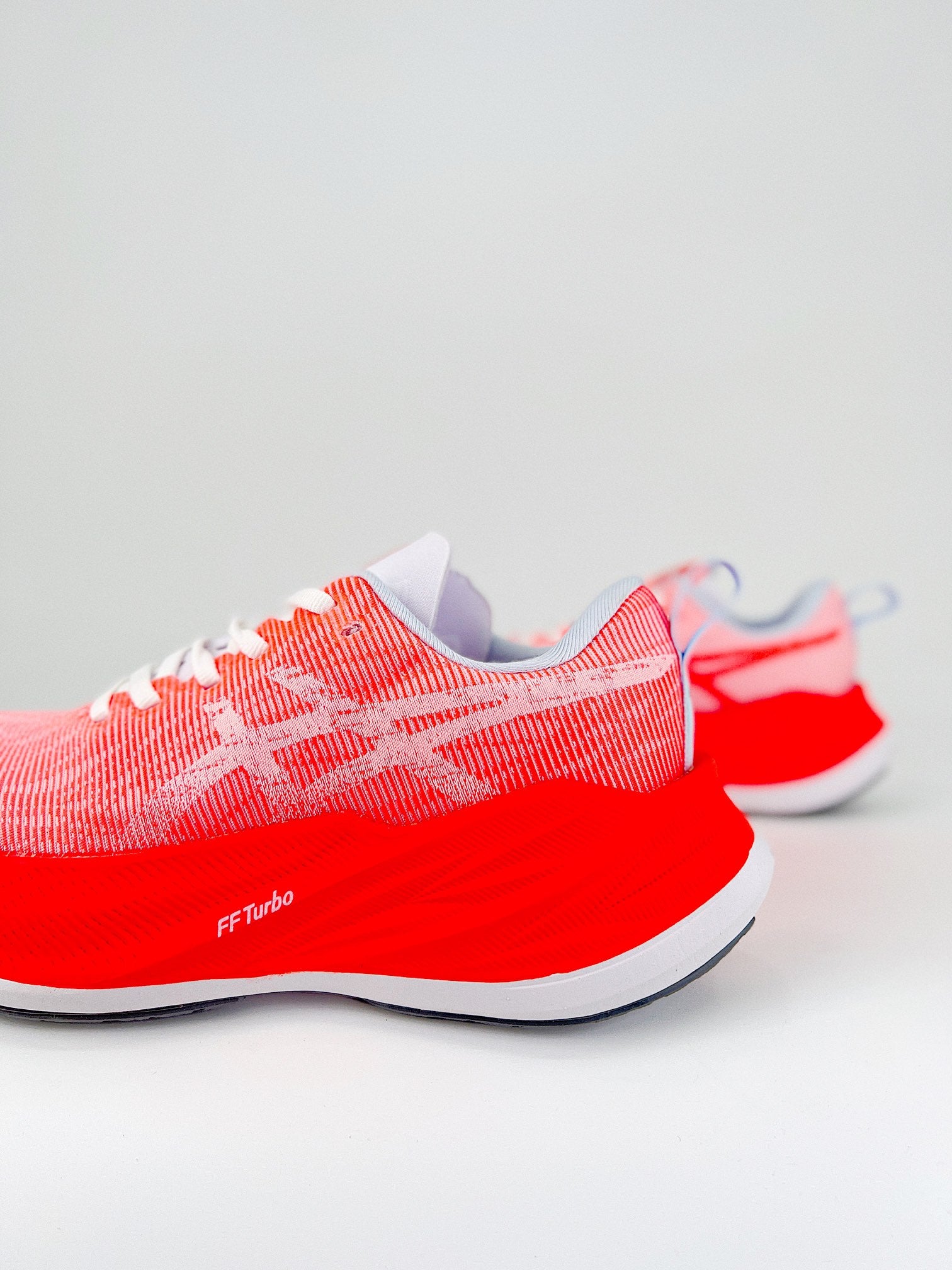 Asics Superblast light red